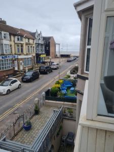 a view of a street from a balcony at The Last Post in Blackpool