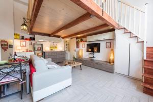 Area soggiorno di Bartolommeo Scala Loft by Mmega