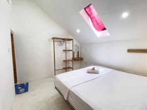 Lara Homestay客房内的一张或多张床位