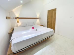 Lara Homestay客房内的一张或多张床位