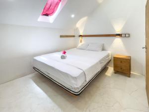 Lara Homestay客房内的一张或多张床位