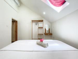 Lara Homestay客房内的一张或多张床位