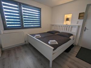Voodi või voodid majutusasutuse Lovely studio with free parking on premisis toas