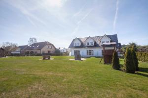 Κήπος έξω από το Heimbürgers Ferienhaus +51 φωτογραφίες