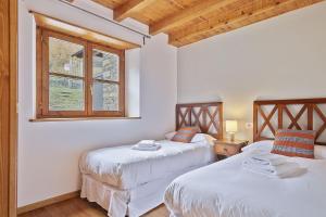 Posteľ alebo postele v izbe v ubytovaní Luderna - Apartamento con terraza Orri A3
