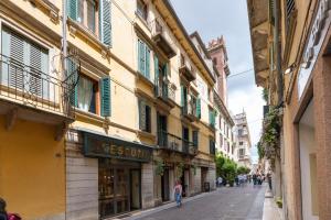 a street in a city with buildings at Sgarzerie Luxury Flat 2 rooms 120mq in Verona