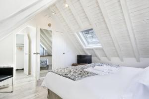 Postel nebo postele na pokoji v ubytování Luderna - Dúplex Sant Miquèu