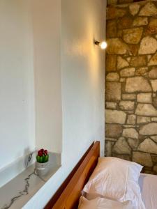 Postel nebo postele na pokoji v ubytování Ambelas Guest Rooms 2