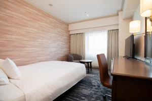 Кровать или кровати в номере Hotel Nikko Kansai Airport - 3 mins walk to the airport