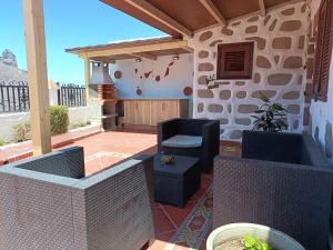 Posedenie v ubytovaní Casita Roque Nublo