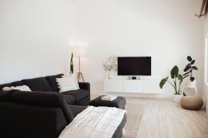 Et tv og/eller underholdning på Turquoise Waters Retreat + 47 billeder