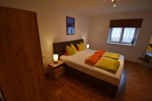 Posteľ alebo postele v izbe v ubytovaní Ferienwohnung Collie