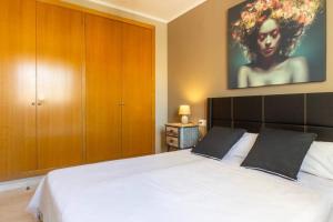 Postel nebo postele na pokoji v ubytování Oliva Apartamento Terrazamar + 25 fotografií
