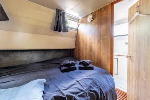 Кровать или кровати в номере Péniche - Nuits insolites