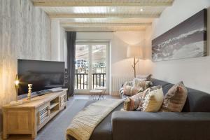 Televízia a/alebo spoločenská miestnosť v ubytovaní Luderna - Apartamento Mirador de Aran