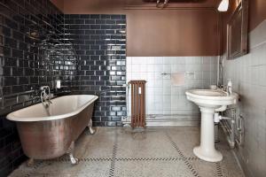 Vonios kambarys apgyvendinimo įstaigoje Smartflats City - Manneken Pis