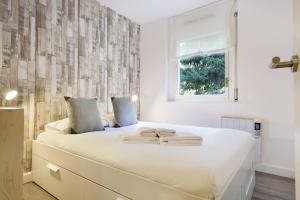 Posteľ alebo postele v izbe v ubytovaní Luderna - Apartamento Mirador de Saumet
