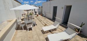 A balcony or terrace at Island Apartment Porto Cesareo