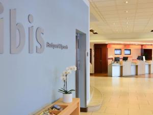 an office with a reception area with a reception desk at Ibis Budapest Citysouth in Budapest