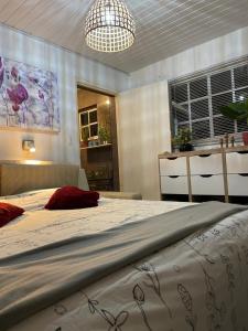 Postel nebo postele na pokoji v ubytování Palmhouse Apartments Aruba 1- 4 persons