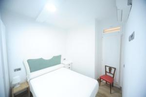 Postel nebo postele na pokoji v ubytování Zona Centro II Orangecosta