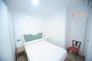 Postel nebo postele na pokoji v ubytování Zona Centro II Orangecosta