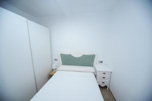 Postel nebo postele na pokoji v ubytování Zona Centro II Orangecosta