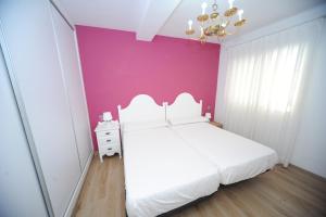 Postel nebo postele na pokoji v ubytování Zona Centro II Orangecosta