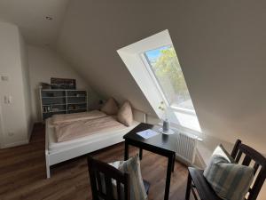 Postel nebo postele na pokoji v ubytování Elb Nest Gästehaus