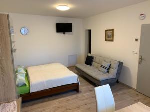 Postel nebo postele na pokoji v ubytování Apartements Studio 964