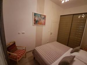 Postel nebo postele na pokoji v ubytování Apartments Oaza