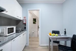 Kuchyň nebo kuchyňský kout v ubytování Família Dória Nóbrega Estúdio