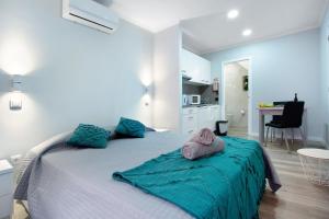 Postel nebo postele na pokoji v ubytování Família Dória Nóbrega Estúdio