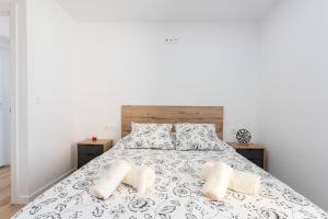 Ένα ή περισσότερα κρεβάτια σε δωμάτιο στο Casa Emilio