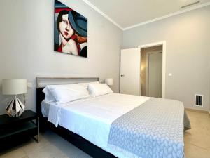 Posteľ alebo postele v izbe v ubytovaní Reinapart Patacona Beachfront Seaview