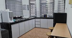 Photo de la galerie de l'établissement Beril Homestay Full Aircond, Free Wifi, Netflix, Water Filter, à Paka