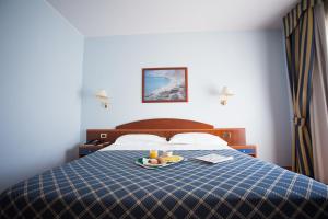Postelja oz. postelje v sobi nastanitve Hotel Levante