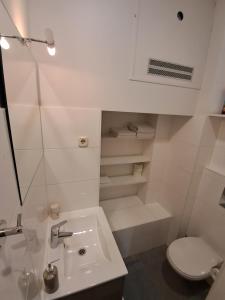 Koupelna v ubytování Apartments Oaza