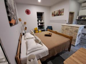 Postel nebo postele na pokoji v ubytování Apartments Oaza