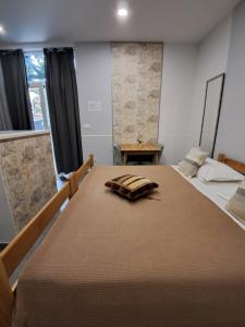 Postel nebo postele na pokoji v ubytování Apartments Oaza