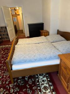Кровать или кровати в номере Zur Baumwolle