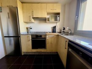 Η κουζίνα ή μικρή κουζίνα στο Apartamento de Begoña +26 φωτογραφίες