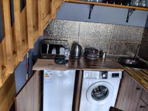 Dapur atau dapur kecil di Kazbegi Cottage Memo