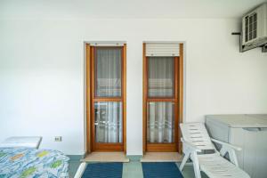 Khu vực ghế ngồi tại Appartamento Passeggiata al Mare