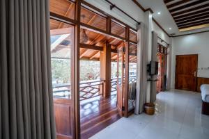 Ένα ή περισσότερα κρεβάτια σε δωμάτιο στο Luangsay Inn +60 φωτογραφίες