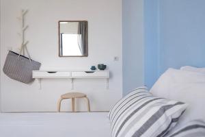Postel nebo postele na pokoji v ubytování Airy Flat at Xenios Avlais