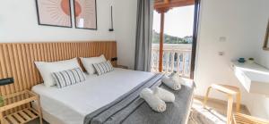 Postel nebo postele na pokoji v ubytování Airy Flat at Xenios Avlais