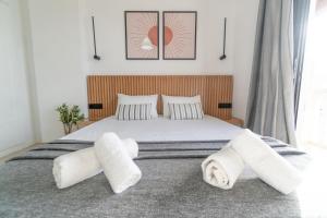 Postel nebo postele na pokoji v ubytování Airy Flat at Xenios Avlais