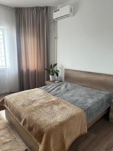 Кровать или кровати в номере Amanat-guesthouse-Bishkek 1