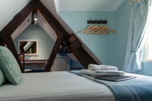 Postel nebo postele na pokoji v ubytování The Dragon Hotel + 76 fotografií